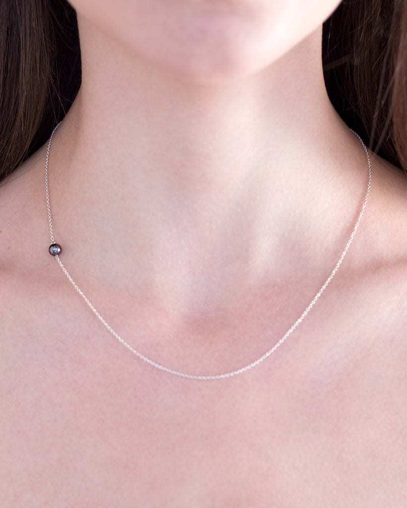 The Interval tiny pearl and silver necklace